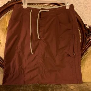 Mountain Hardwear rusty brown, water-wicking nylon outdoor athletic skirt
